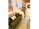 Comfortable green couch in a cozy living room setting with an eye-catching throw pillow at 309 Meeting St # 19, Charleston, SC 29401