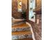 Unique stairway with decorative tile accents and exposed brick, a stylish transition at 309 Meeting St # 19, Charleston, SC 29401