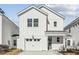 Charming two-story home with a well-manicured front yard and attached garage at 348 Chapman Cir, Goose Creek, SC 29445