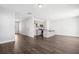 Spacious living room and kitchen area with modern gray cabinets and island at 348 Chapman Cir, Goose Creek, SC 29445