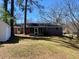 Spacious backyard with brick home, screened in porch and storage shed at 377 Furman Ln, Ladson, SC 29456