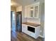 Modern kitchen with stainless steel appliances, stylish white cabinets, and butcher block countertops at 377 Furman Ln, Ladson, SC 29456