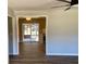Open concept living space with modern flooring and seamless transition to outdoor patio at 377 Furman Ln, Ladson, SC 29456