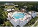 Aerial view of a Jr Olympic swimming pool, open air pavilion, playground and tennis courts in the community at 3846 Delinger Dr, Mount Pleasant, SC 29466