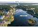 Aerial view of new construction homes near the lake with boardwalks and a future lakeside pool at 3846 Delinger Dr, Mount Pleasant, SC 29466