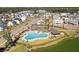 Aerial view of the community's pool, outdoor kitchen, and surrounding neighborhood at 3846 Delinger Dr, Mount Pleasant, SC 29466