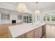 Bright, open-concept kitchen featuring a large island, modern appliances and a view of the living area at 3846 Delinger Dr, Mount Pleasant, SC 29466