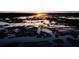 Scenic marsh view at sunset featuring a boardwalk and covered pier at 3846 Delinger Dr, Mount Pleasant, SC 29466