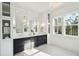Elegant bathroom with dual sinks, custom cabinetry, and stylish fixtures at 3866 Delinger Dr, Mount Pleasant, SC 29466