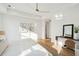Light-filled bedroom with white walls, light wood floors, and stylish furnishings at 3866 Delinger Dr, Mount Pleasant, SC 29466