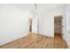 Spacious bedroom with hardwood floors, white walls, and convenient access to bathroom at 3866 Delinger Dr, Mount Pleasant, SC 29466