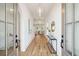 Welcoming entryway with hardwood floors, stylish console table, and open view of living room at 3866 Delinger Dr, Mount Pleasant, SC 29466