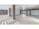 Spacious garage with multiple garage doors, concrete pillars, and ample room for vehicles and storage at 3866 Delinger Dr, Mount Pleasant, SC 29466