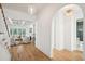 Inviting living room is showcased by wood floors, coffered ceilings, and a charming fireplace at 3866 Delinger Dr, Mount Pleasant, SC 29466
