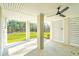 Covered patio with a ceiling fan, offering an outdoor living space with a view of the green yard at 3866 Delinger Dr, Mount Pleasant, SC 29466