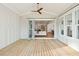 Inviting porch shows wood flooring, ceiling fan, and an open view into the home and its interior spaces at 3866 Delinger Dr, Mount Pleasant, SC 29466