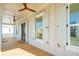 Long open porch with wooden floor and views of the community at 3866 Delinger Dr, Mount Pleasant, SC 29466