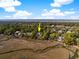 Scenic aerial view of property surrounded by lush greenery and winding waterways at 4 Falcon Point Rd, Kiawah Island, SC 29455