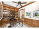 Sophisticated home office with custom built-ins, wood paneling, and a classic desk creating a productive workspace at 4 Falcon Point Rd, Kiawah Island, SC 29455