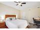 Well-lit bedroom featuring a ceiling fan and a dedicated workspace with room to personalize at 404 Terrier Rd, Goose Creek, SC 29445