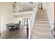 Inviting entryway featuring a staircase, and open floor plan, offering a bright and airy atmosphere at 404 Terrier Rd, Goose Creek, SC 29445