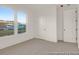 Bright bedroom with large windows offering scenic views, plus two closet doors for storage at 409 Avocet Dr # 553P, Summerville, SC 29486