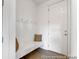 Clean entryway features built-in bench seating and storage for a clutter-free arrival at 409 Avocet Dr # 553P, Summerville, SC 29486