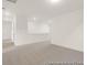 Open concept living area with neutral carpet, recessed lighting, and an airy feel at 409 Avocet Dr # 553P, Summerville, SC 29486