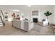 Bright living room features a fireplace, comfortable seating, and an open floor plan at 409 Avocet Dr # 553P, Summerville, SC 29486