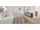 Comfortable main bedroom offers a dresser and access to a bathroom, creating a private retreat at 409 Avocet Dr # 553P, Summerville, SC 29486