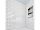 A tiled shower with a niche at 415 Parkdale Dr # 12 A, Charleston, SC 29414