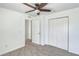 Bedroom with carpet, fan, closet, and natural light from window at 415 Parkdale Dr # 12 A, Charleston, SC 29414