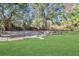 Fenced dog park with lush grass provides a safe and enjoyable space for pets to exercise and socialize at 415 Parkdale Dr # 12 A, Charleston, SC 29414
