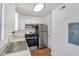 Modern kitchen features stainless steel appliances, white cabinets, and a sleek countertop at 415 Parkdale Dr # 12 A, Charleston, SC 29414