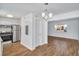 Updated kitchen with stainless steel appliances and eat-in dining area with decorative lighting at 415 Parkdale Dr # 12 A, Charleston, SC 29414