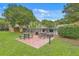Community picnic area with brick patio, picnic tables, grills, and access to the community pool at 415 Parkdale Dr # 12 A, Charleston, SC 29414