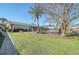 Exterior view of a community pool with lush landscaping and comfortable lounging area, perfect for relaxation at 415 Parkdale Dr # 12 A, Charleston, SC 29414
