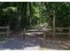 Scenic view of a paved trail surrounded by lush greenery and trees for walking, running, or biking at 415 Parkdale Dr # 12 A, Charleston, SC 29414