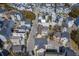 An aerial view displays a neighborhood with vibrant colored homes along tree-lined streets at 4341 Cordial Aly, North Charleston, SC 29405