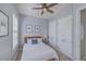 This cozy bedroom features a ceiling fan, two closets, and soft neutral paint at 4341 Cordial Aly, North Charleston, SC 29405