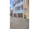 Charming three-story home with a two-car garage and cobblestone driveway at 4341 Cordial Aly, North Charleston, SC 29405
