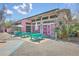 An exterior view of a Paradiso building with bright colors and outdoor seating at 4341 Cordial Aly, North Charleston, SC 29405