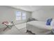 Bright bedroom with large windows, soft carpeting, and stylish decor at 4497 Ocean Farm Dr, Summerville, SC 29485