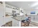 Open kitchen layout with an island, granite countertops, and bar stool seating area at 4497 Ocean Farm Dr, Summerville, SC 29485