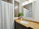 Bathroom featuring stylish vanity with stone countertop and decorative accents at 51 Gadsden St # B, Charleston, SC 29401