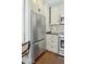 Kitchen area showcases stainless steel refrigerator, range, microwave, and stylish backsplash at 51 Gadsden St # B, Charleston, SC 29401