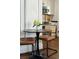 Dining area with a round table, modern chairs, and view of the stylish kitchen at 51 Gadsden St # B, Charleston, SC 29401