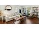 Cozy living room with a comfortable sofa, natural light, and stylish decor accents at 51 Gadsden St # B, Charleston, SC 29401