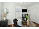 Bright office space with a glass desk, modern decor, and natural light at 51 Gadsden St # B, Charleston, SC 29401