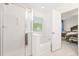 Well-lit bathroom with a shower, bathtub, and access to main bedroom at 558 Wynfield Forest Dr, Summerville, SC 29485